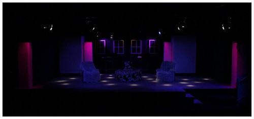 (Image: Production Shot of the Stage in
   Blue and Mauve)