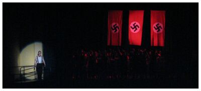 (Image: The Spell is complete as Banners drop and Salutes Reveal
 what will become the True Horror of German Socialism.)