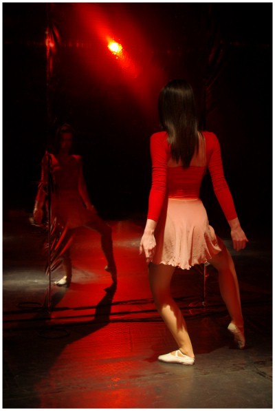 (Image: Cassie Dances in front of a Mirror)