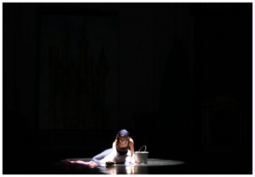(Image: Cinderella Cleans the Floor in a
  Pool of Light)