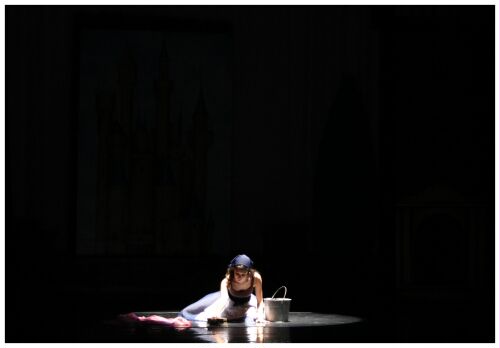 (Image: Cinderella Cleans the Floor in a
  Pool of Light)