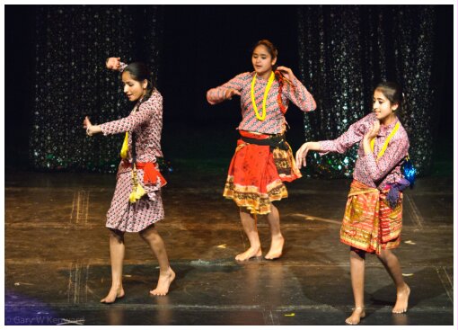 (Image: Three Asian Dancers in Traditional Attire)