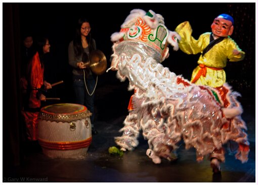 (Image: Two Percussionists Keep Beat while a Dragon and Dancer
   Perform)