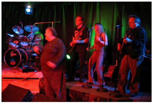 (Image: Sam at Floor Level with The `Time Bandits' on Stage)