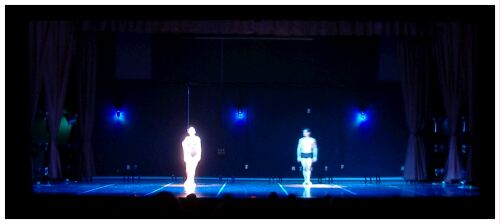 (Image: Two Dancers, Each in a Narrow Light Pool)