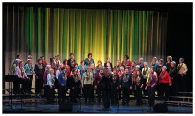 (Image: The ScotianAires in Red with Yellow and Green on the
  Back Curtain)
