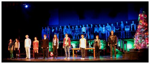 (Image: The Main Cast Downstage Sings `Seasons of Love' with the
  Chorus on Upstage Scaffolding)
